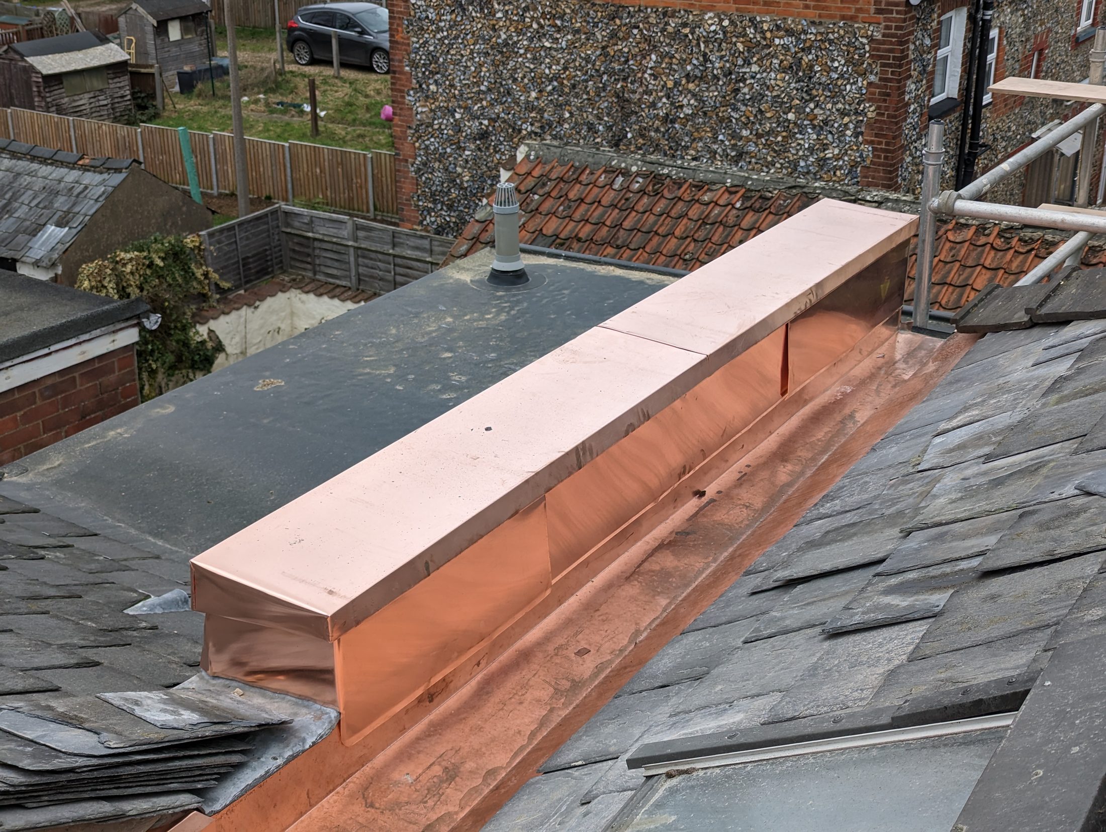 Close detail of Copperclad copper guttering and roof junction