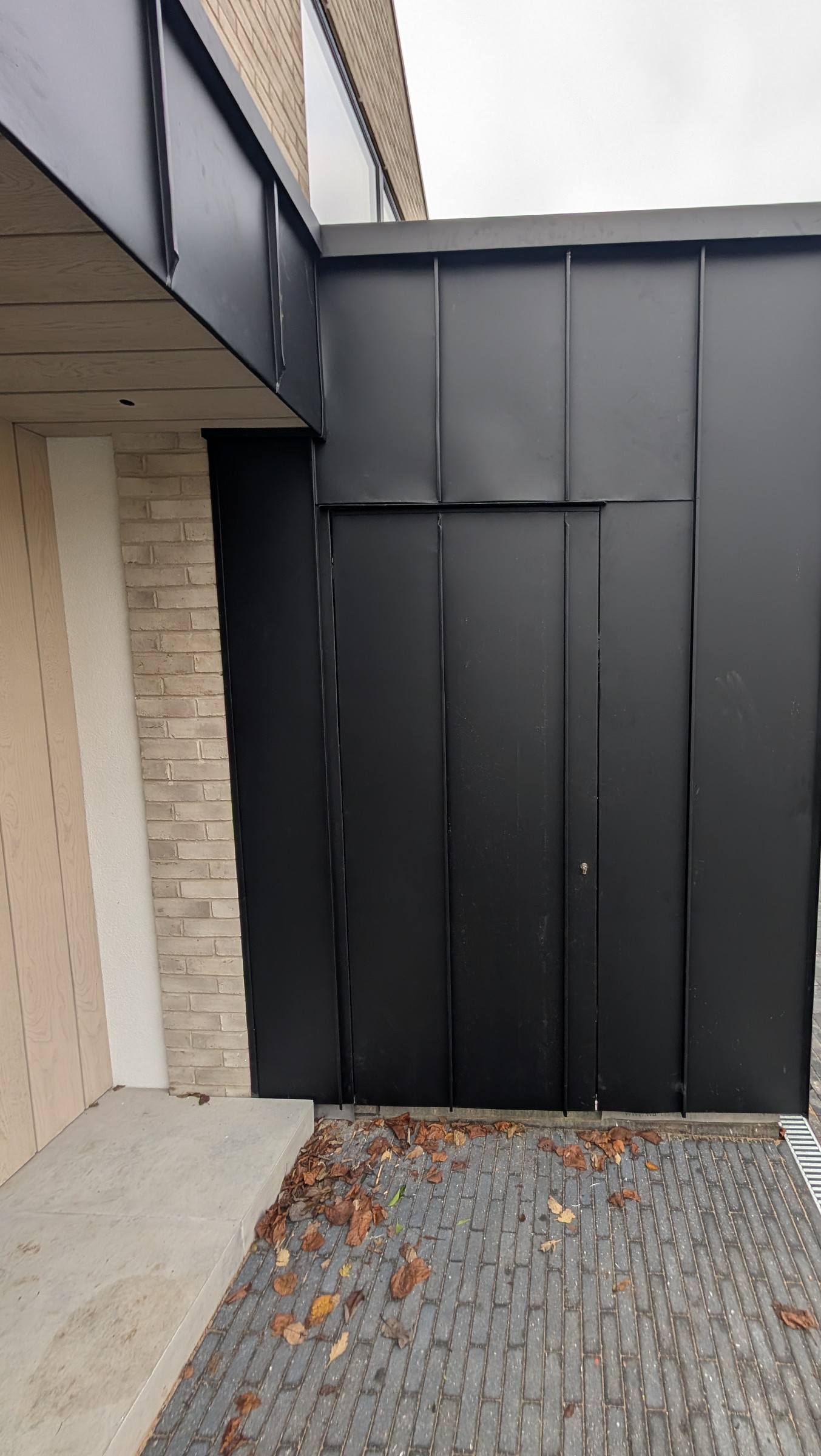 Black Standing Seam Secret Door image 2