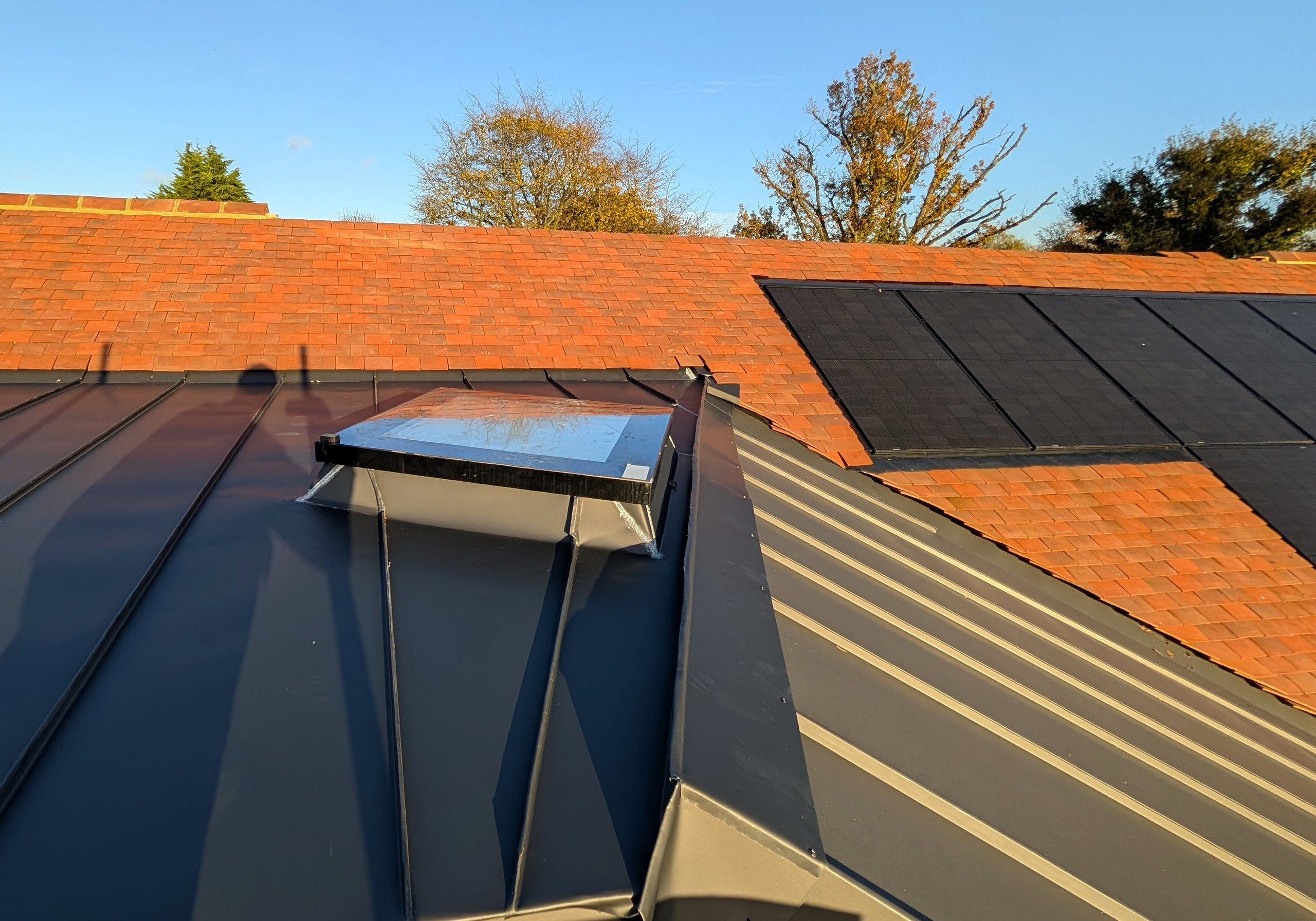 Finished elZinc Oliva rooflight and roof-plane detail