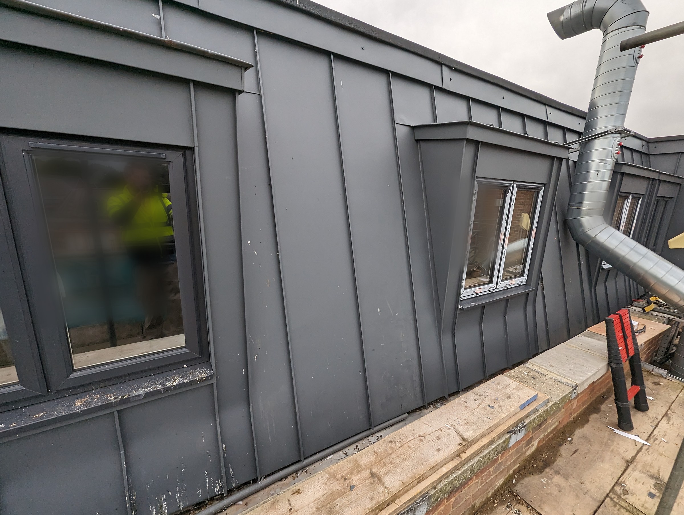 GreenCoat Anthracite apartments finished overall view