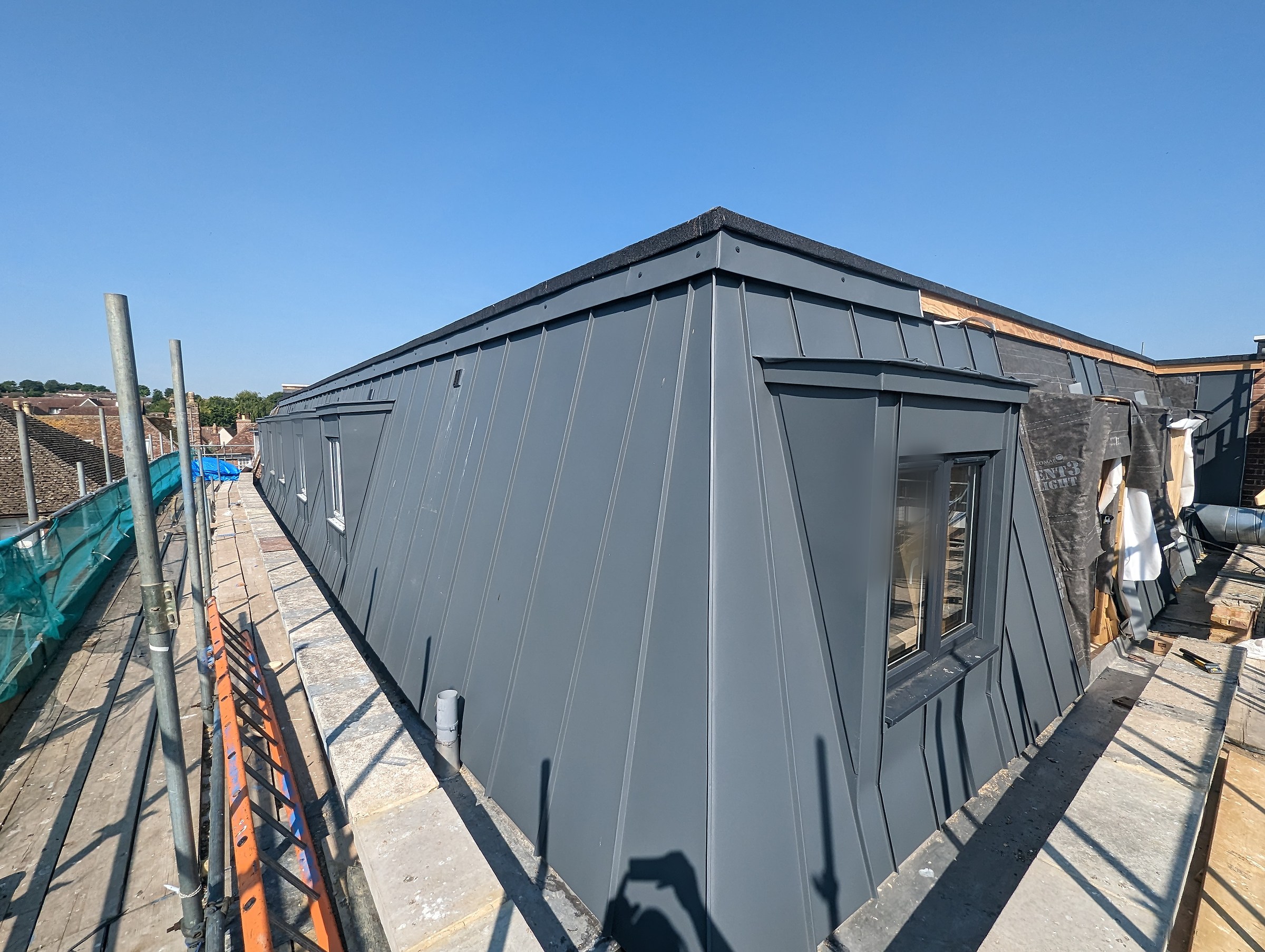 GreenCoat Anthracite apartments construction corner installation