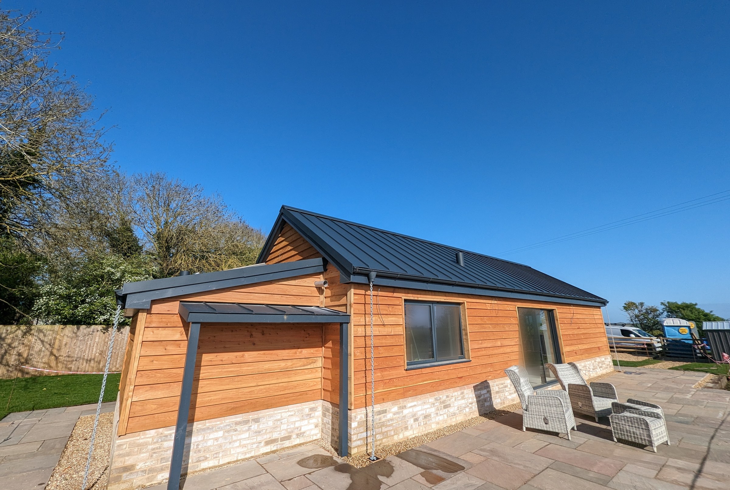 PREFA Anthracite cottage hero view