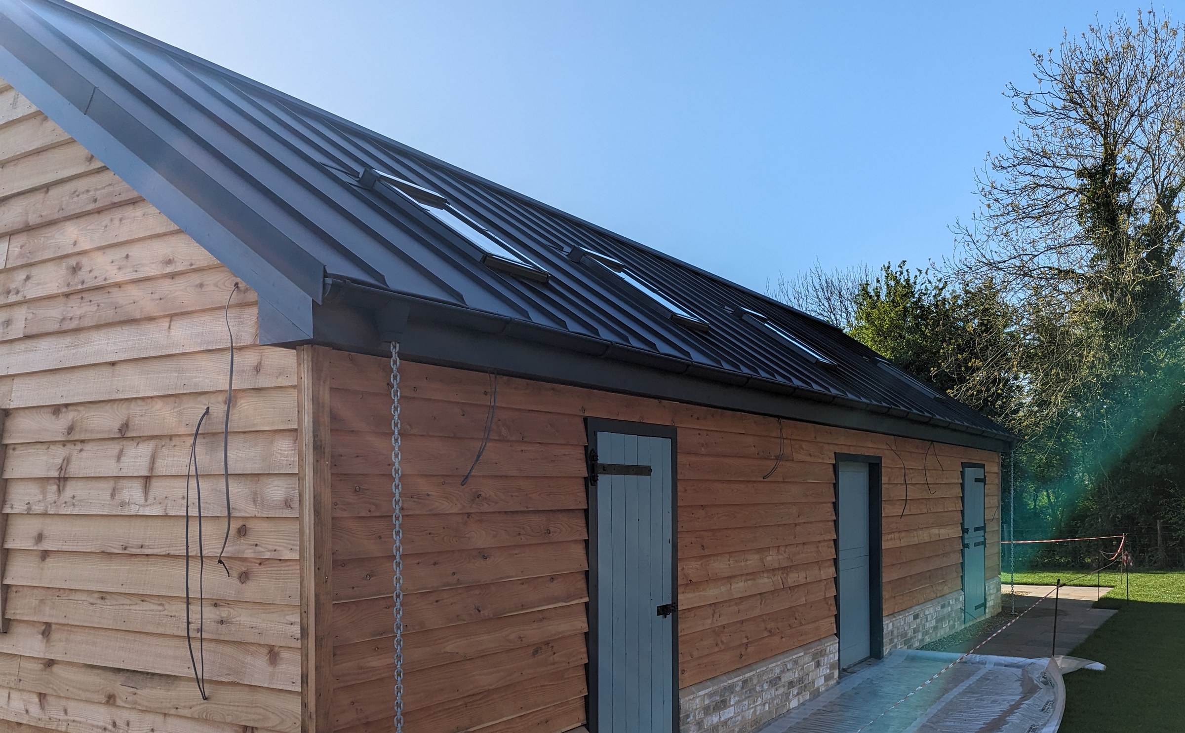 PREFA Anthracite cottage finished rear rooflight elevation