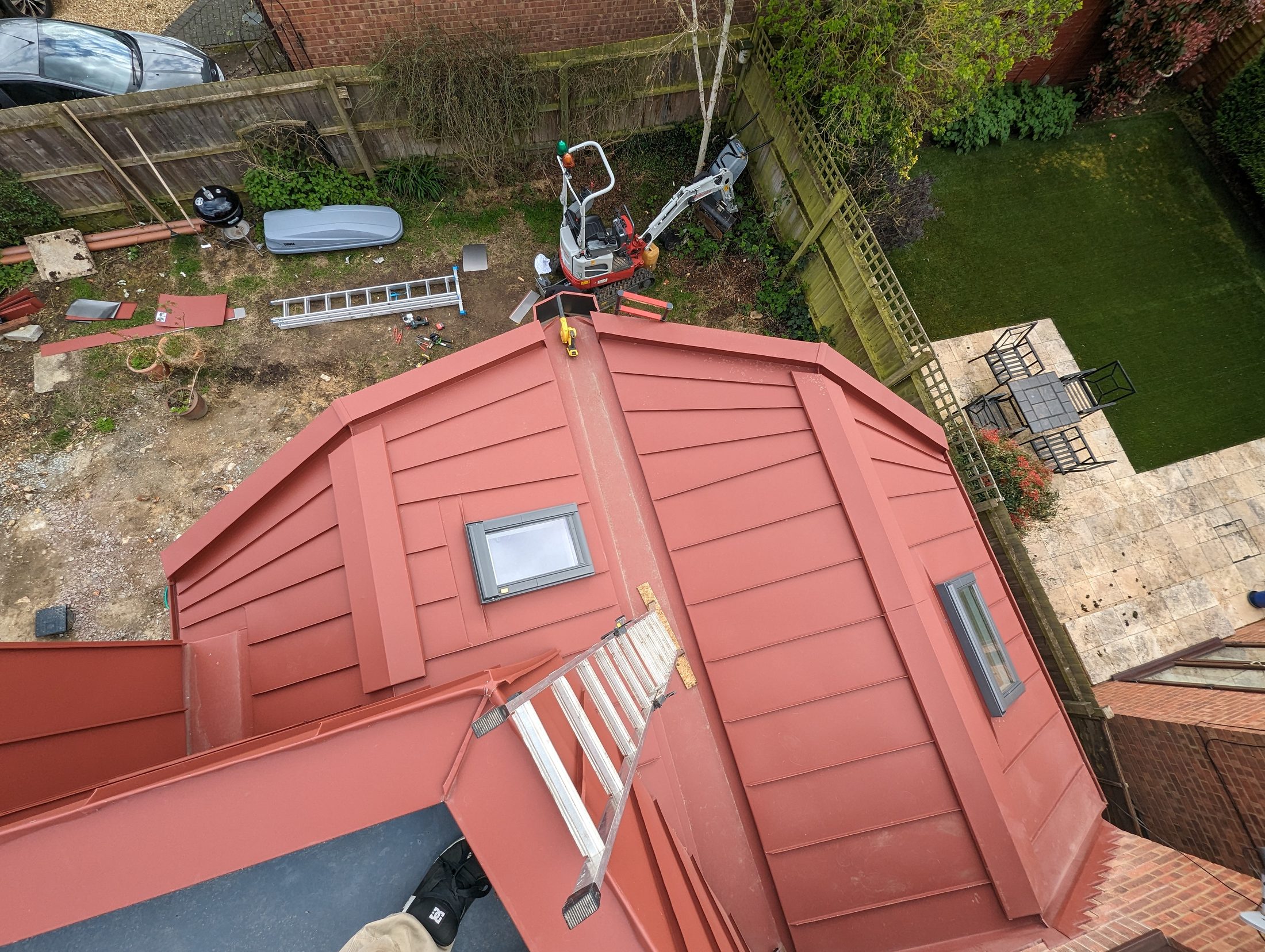Red PREFA extension project photograph 7
