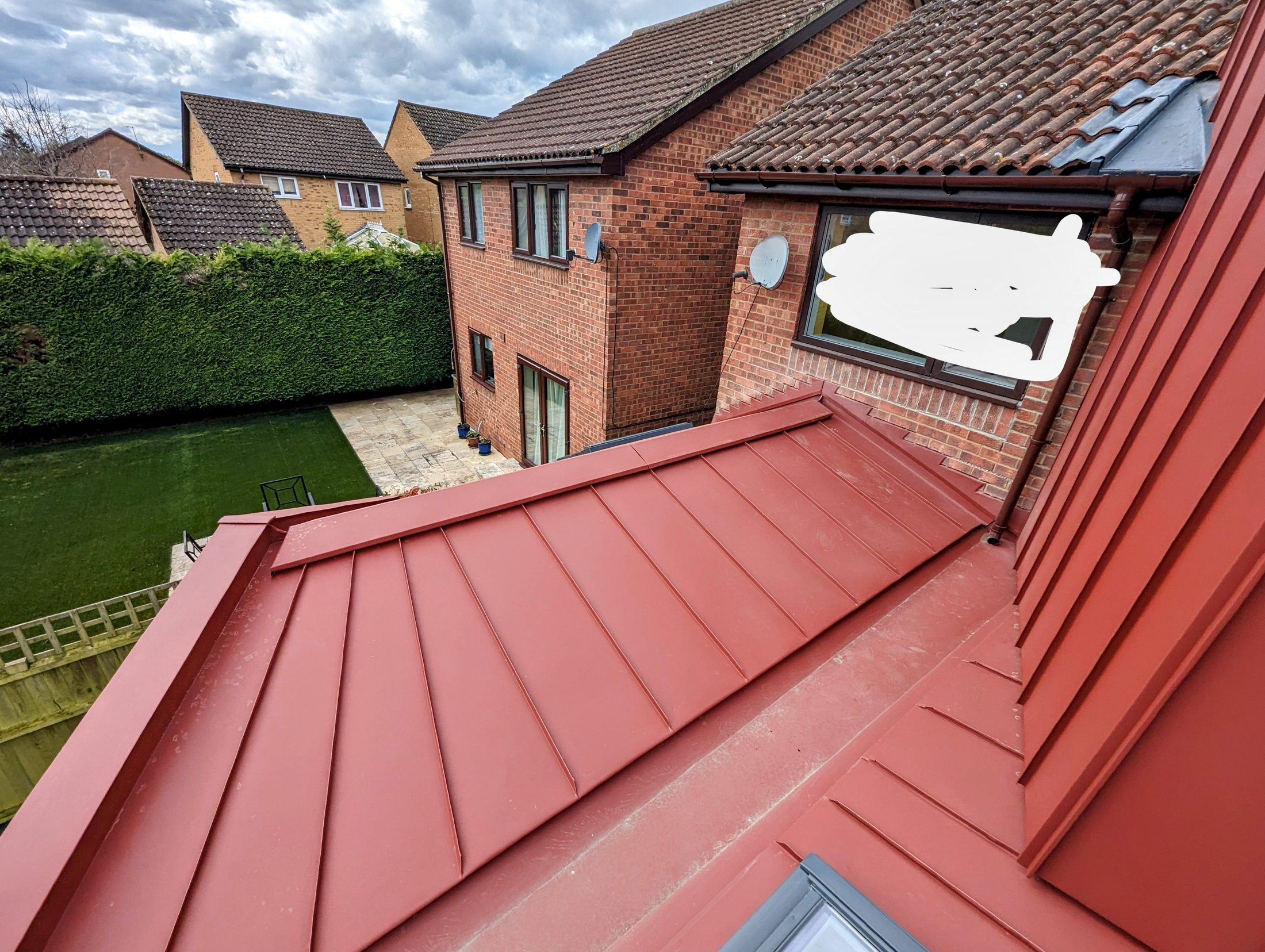 Red PREFA extension project photograph 9