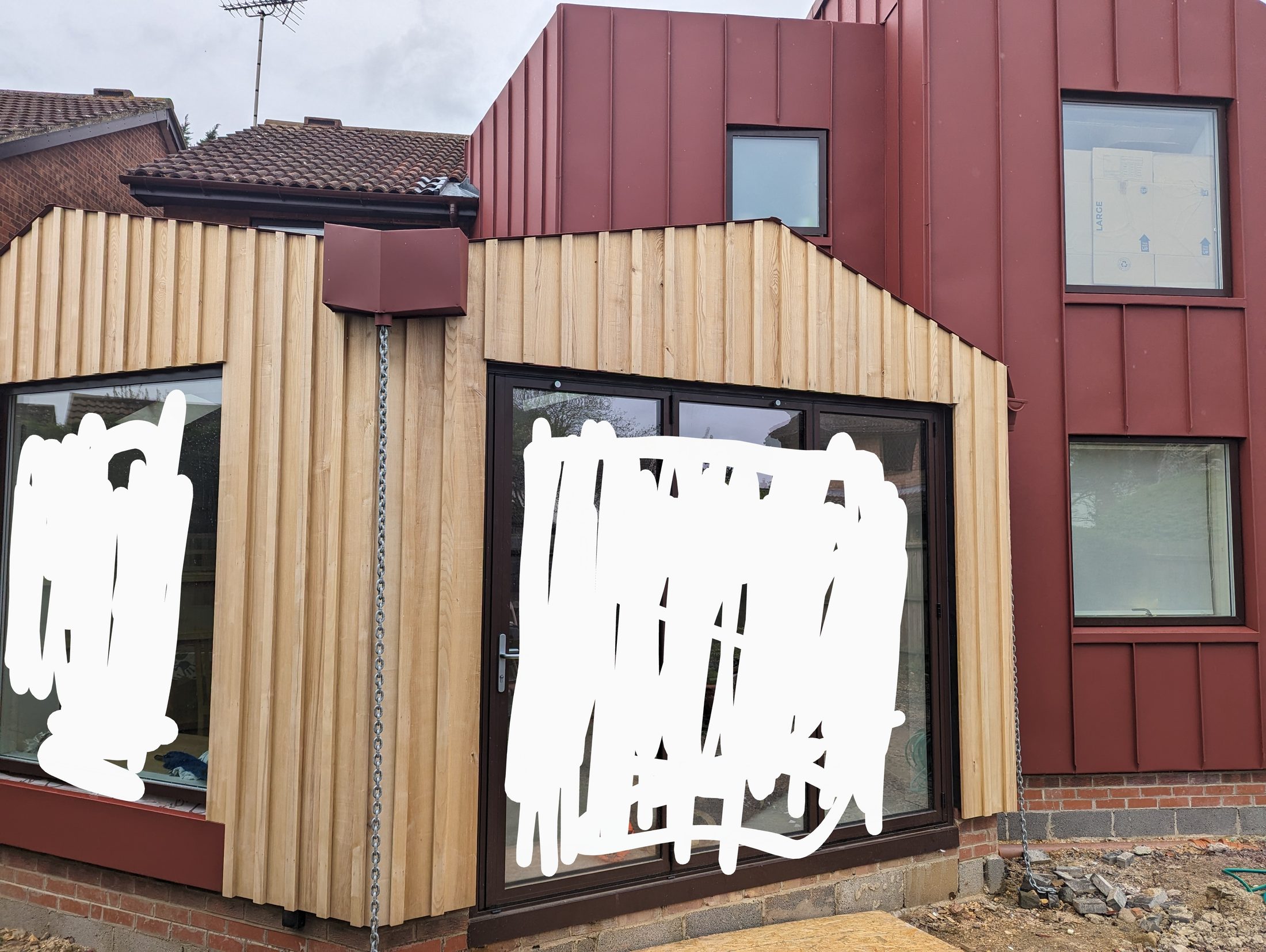 Red PREFA extension project photograph 13