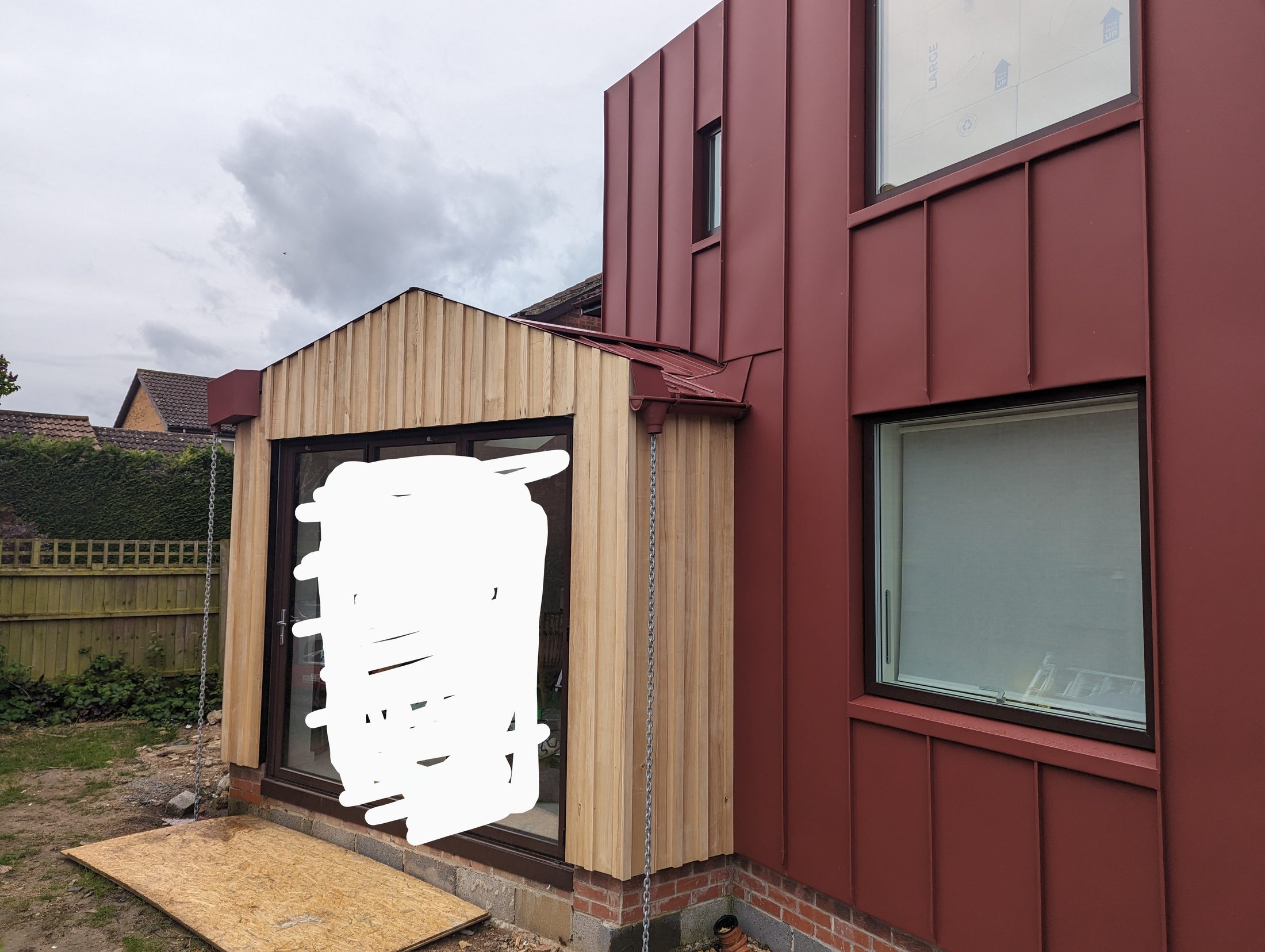 Red PREFA extension project photograph 14