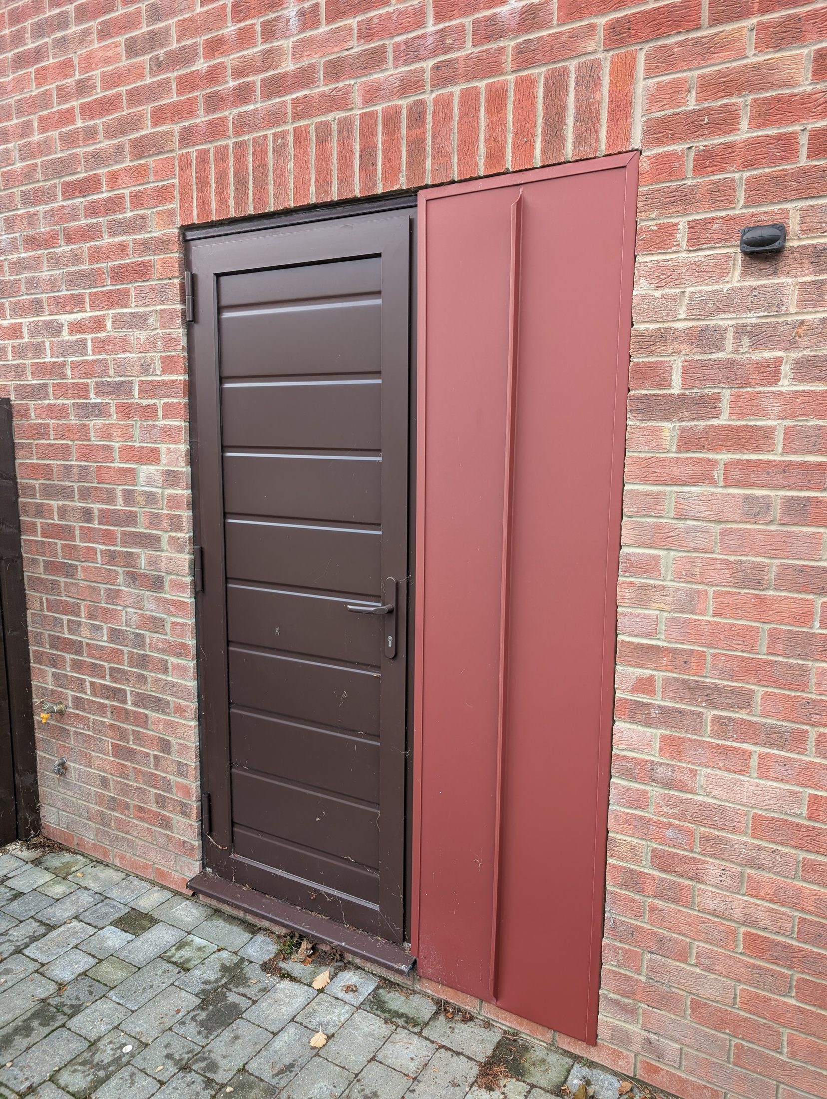 Red PREFA extension project photograph 17