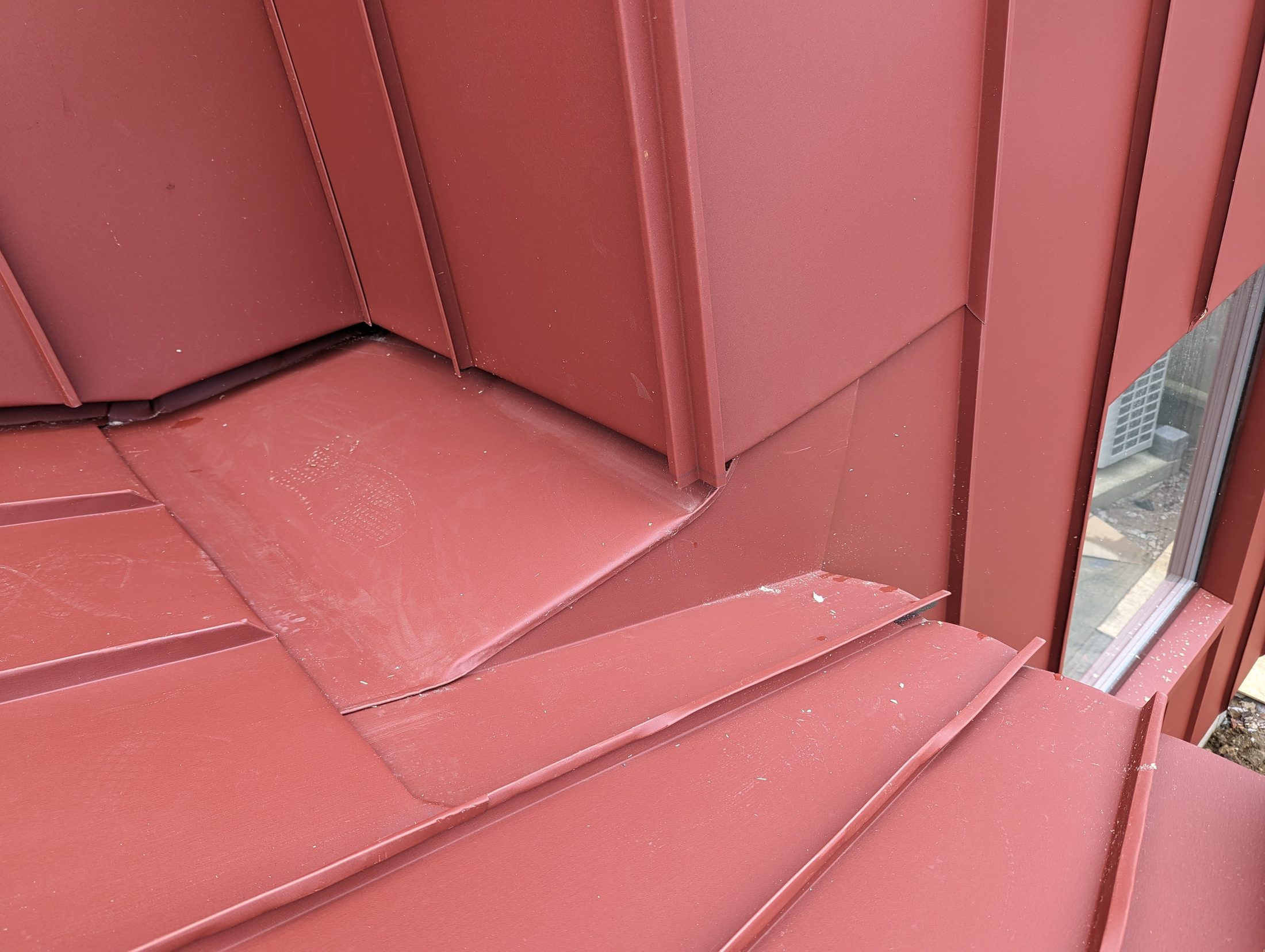 Red PREFA extension project photograph 2
