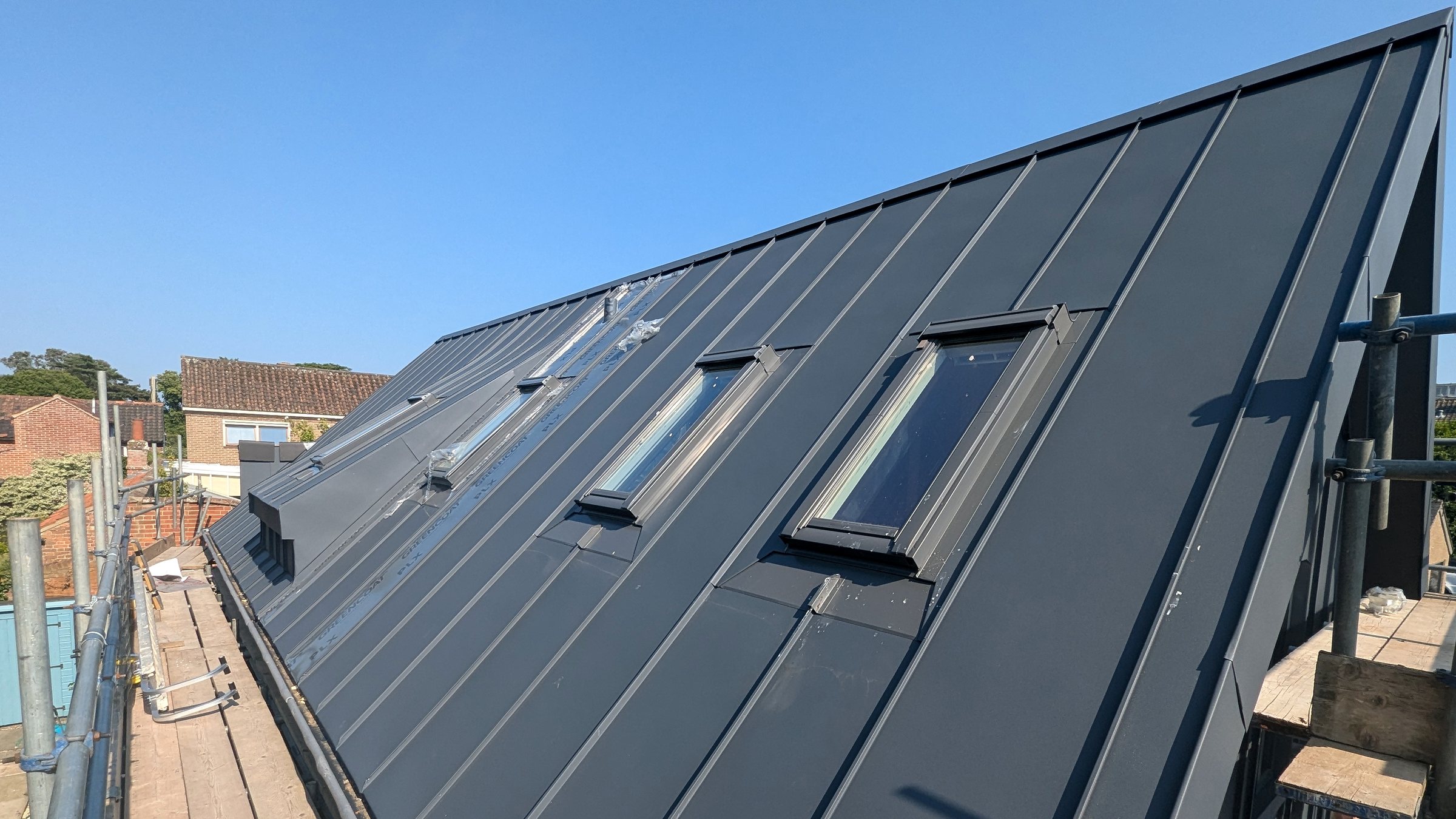 Completed standing-seam roof with integrated rooflights