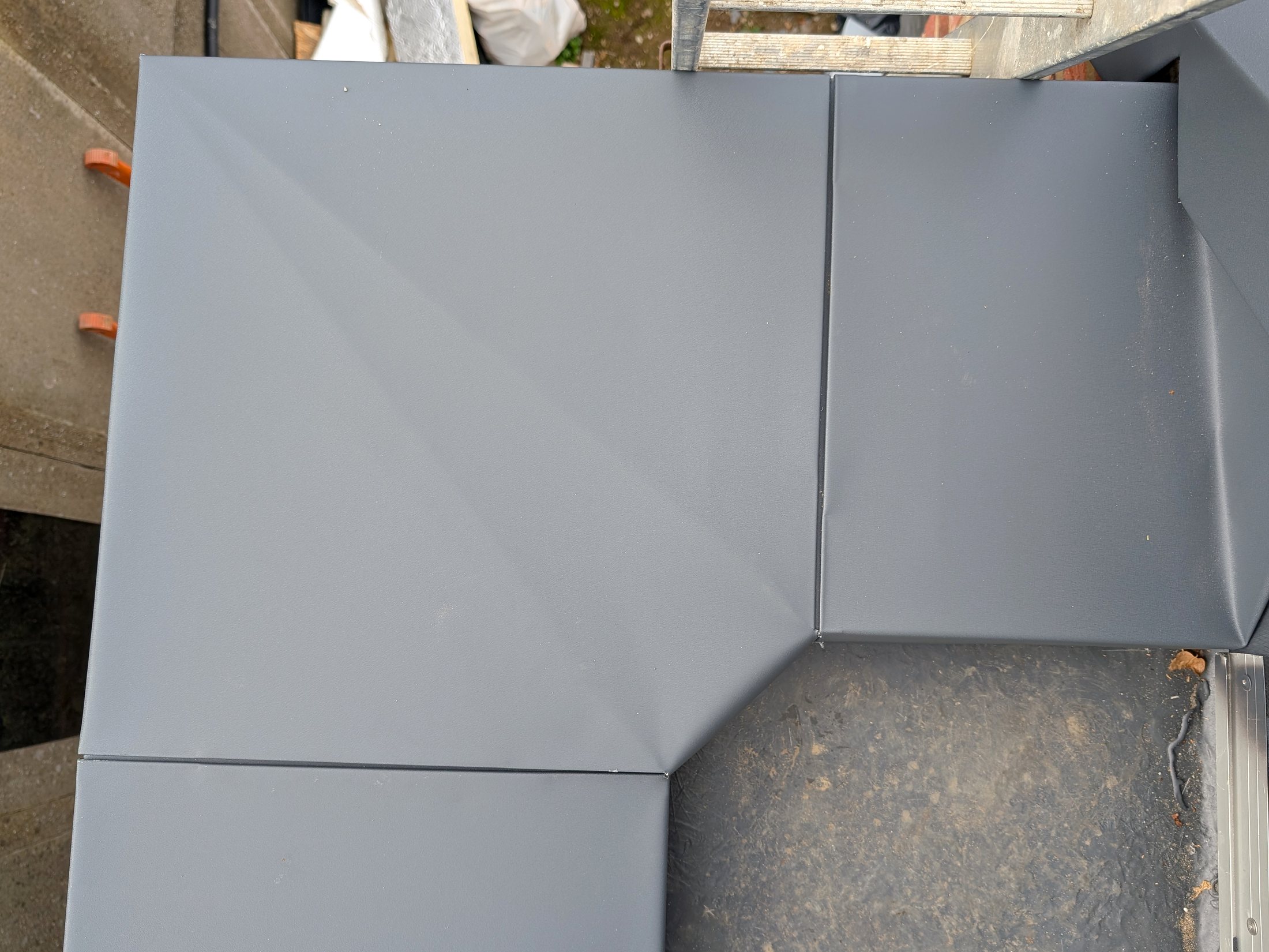 Close finished folded-metal junction detail